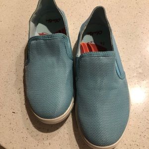 Olukai sample size 1. Never worn slip ons.